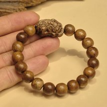 Trầm tốc vườn tròn đơn đan dây mix charm gỗ trầm 10li theo bản mệnh  